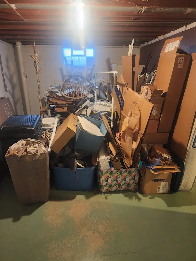 Roll-off dumpster container at job site for 20 Yard Dumpster Rental in Reedley